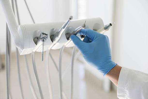 Professional Tooth Extraction technician working in Duncan, OK